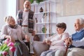 Senior friends spending time together in the retirement home Royalty Free Stock Photo