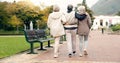 Senior friends, talking and walking together on an outdoor path to relax in nature with elderly women in retirement Royalty Free Stock Photo