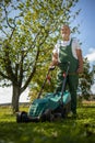 Senior gardenr gardening in his permaculture garden Royalty Free Stock Photo