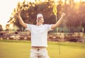 Senior golfer rejoiced at his victory. Man on golf filed Royalty Free Stock Photo