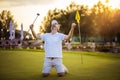 Winner. The senior golfer rejoiced at his victory. Man on golf filed Royalty Free Stock Photo