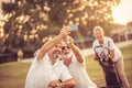 Senior golfers using phone and taking self portrait. Royalty Free Stock Photo