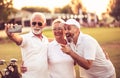 Golfers using phone and taking self portrait Royalty Free Stock Photo