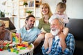 Senior grandparents playing with grandchildren and having fun with family Royalty Free Stock Photo