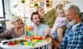 Senior grandparents playing with grandchildren and having fun with family Royalty Free Stock Photo