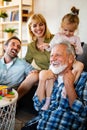 Senior grandparents playing with grandchildren and having fun with family Royalty Free Stock Photo