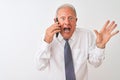 Senior grey-haired businessman talking on the smartphone over isolated white background very happy and excited, winner expression Royalty Free Stock Photo