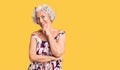 Senior grey-haired woman wearing casual clothes looking confident at the camera with smile with crossed arms and hand raised on Royalty Free Stock Photo