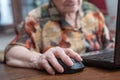 Senior hand using the mouse of a computer Royalty Free Stock Photo