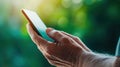 Senior Hands Using Smartphone Close-Up