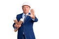 Senior handsome grey-haired man wearing architect hardhat holding blueprints with open hand doing stop sign with serious and Royalty Free Stock Photo