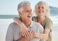 Senior, happy couple and hug on beach in support, love or care for bonding, weekend or break together. Elderly man and Royalty Free Stock Photo