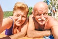 Senior happy couple taking selfie at beach resort in Thailand trip on tropical tour - Adventure and fun concept of active elderly Royalty Free Stock Photo