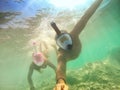 Senior happy couple taking selfie in tropical sea excursion with water camera - Boat trip snorkeling in exotic scenarios - Active Royalty Free Stock Photo