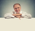 Senior happy man with blank space white banner Royalty Free Stock Photo
