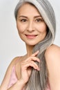 Senior happy middle aged mature asian woman headshot portrait. Skincare ads. Royalty Free Stock Photo