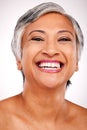 Senior, happy woman and portrait with teeth in dental, hygiene or skincare against a studio background. Closeup or face Royalty Free Stock Photo