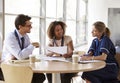 Senior healthcare consultation in a meeting room, close up