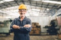 Senior high skill professional engineer male worker in heavy industry factory standing confident. portrait healthy elderly smart Royalty Free Stock Photo