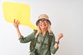 Senior hiker woman wearing canteen holding speech bubble over isolated white background screaming proud and celebrating victory Royalty Free Stock Photo