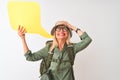 Senior hiker woman wearing canteen holding speech bubble over isolated white background stressed with hand on head, shocked with Royalty Free Stock Photo