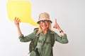 Senior hiker woman wearing canteen holding speech bubble over isolated white background surprised with an idea or question Royalty Free Stock Photo