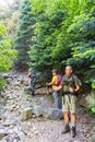 Senior hikers resting