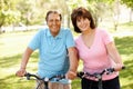 Senior Hispanic couple on bikes Royalty Free Stock Photo