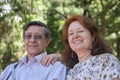 Senior Hispanic couple enjoying time together in a park, outdoors Royalty Free Stock Photo