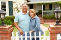 Senior Hispanic couple outside home Royalty Free Stock Photo