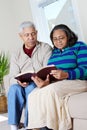 Senior Hispanic Couple Reading Bible Royalty Free Stock Photo