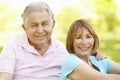 Senior Hispanic Couple Relaxing In Park Royalty Free Stock Photo