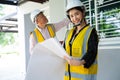 Senior home inspector checking home defects and teaching young engineers, before handing it over to client. Young engineers learn Royalty Free Stock Photo