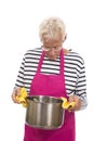 Houseman with pink apron and cooking pan Royalty Free Stock Photo