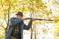 Senior hunter with gun ready to shoot his rifle Royalty Free Stock Photo