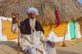 Senior indian man lives in a traditional village house with his family near Jasialmer,Rajasthan Royalty Free Stock Photo