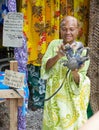 Senior indigenous lady holding a Coconut Crab