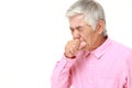 Senior Japanese man coughing