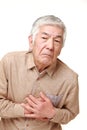 Senior Japanese man heart attack Royalty Free Stock Photo