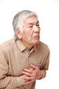 Senior Japanese man heart attack Royalty Free Stock Photo