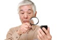 Senior Japanese man with presbyopia