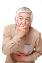 senior Japanese man vomit Royalty Free Stock Photo