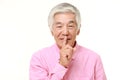 senior Japanese man whith silence gestures