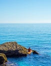 Senior kayaker on a kayak by the sea, active water sport and lei