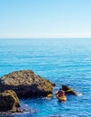 Senior kayaker on a kayak by the sea, active water sport and lei