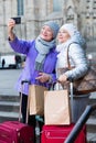 Senior ladies making selfie outdoors