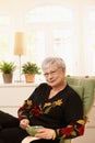 Senior lady having tea at home Royalty Free Stock Photo