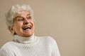 Senior lady portrait, laughing, copy space. Royalty Free Stock Photo