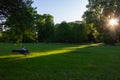 senior lady sitting on park bench