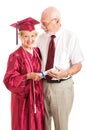 Senior Lady and Spouse Celebrate Her Graduation Royalty Free Stock Photo